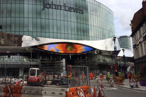 scanning eye-shaped big screen at Birmingham New Street railway station